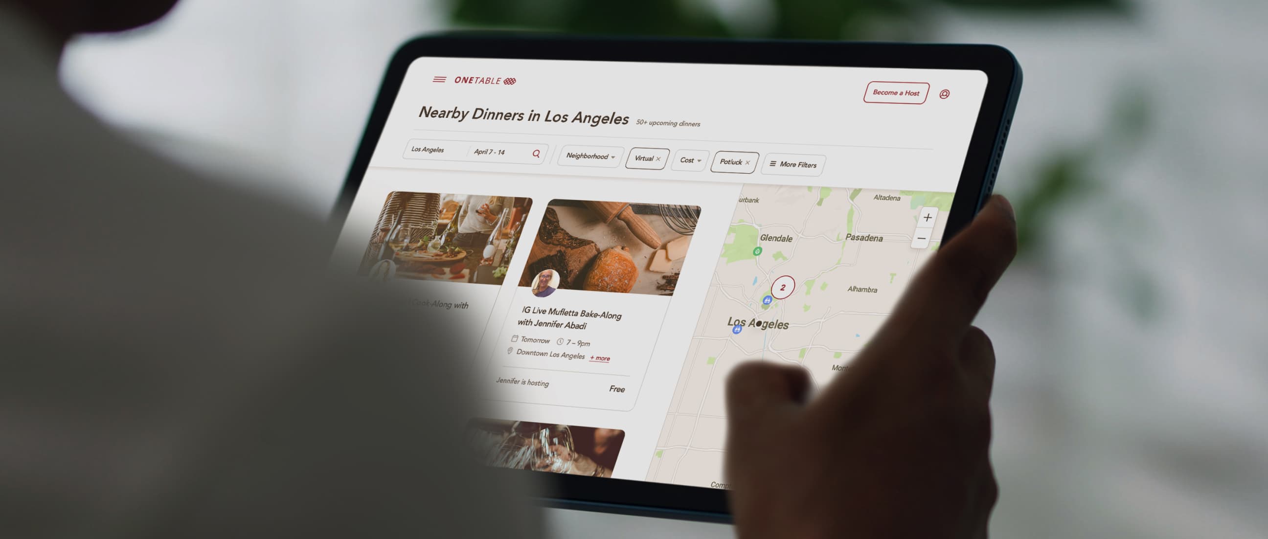 OneTable mobile responsive design showing a user searching for events in Los Angeles on a tablet device